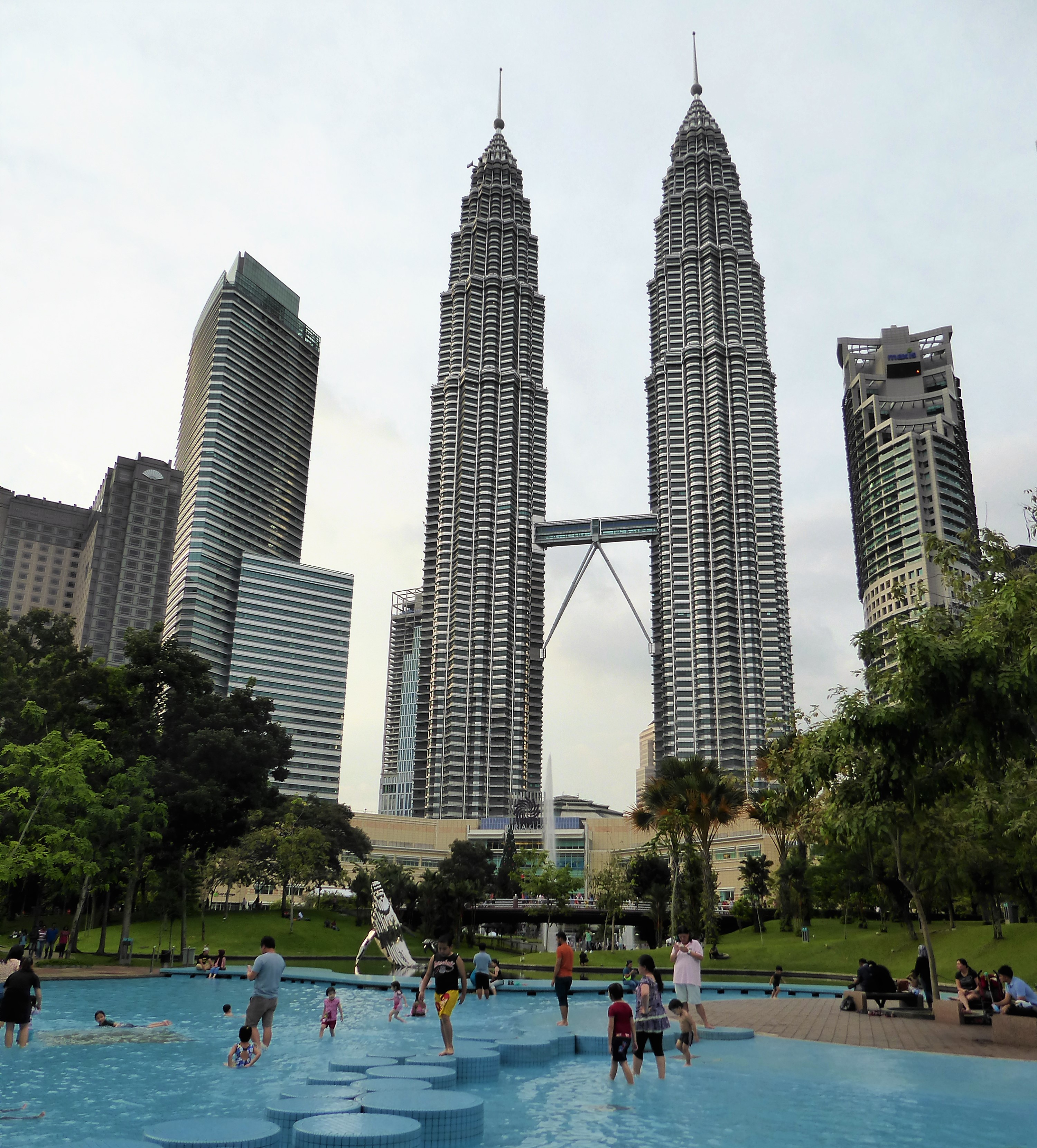 KL Travel Guide Kids Swimmingpool and Petronas Towers