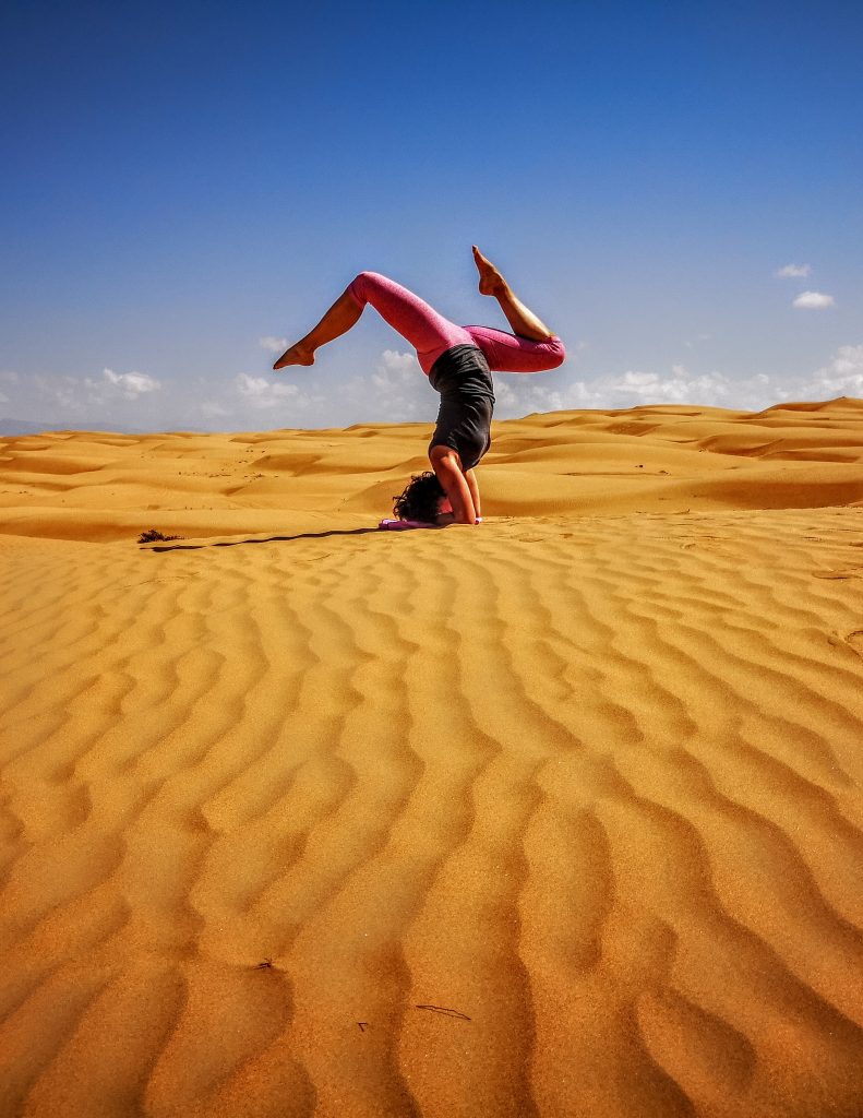 Desert yoga pose, Oman