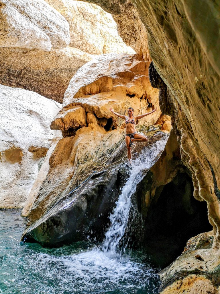 Yoga pose in the Wadi Shab, Oman