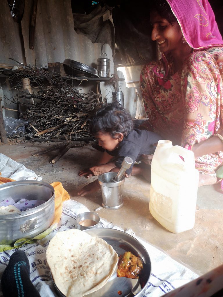 Sarda playing with their youngest son