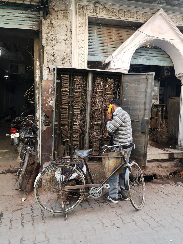 Fixing a telephone problem in the streets of Mathura