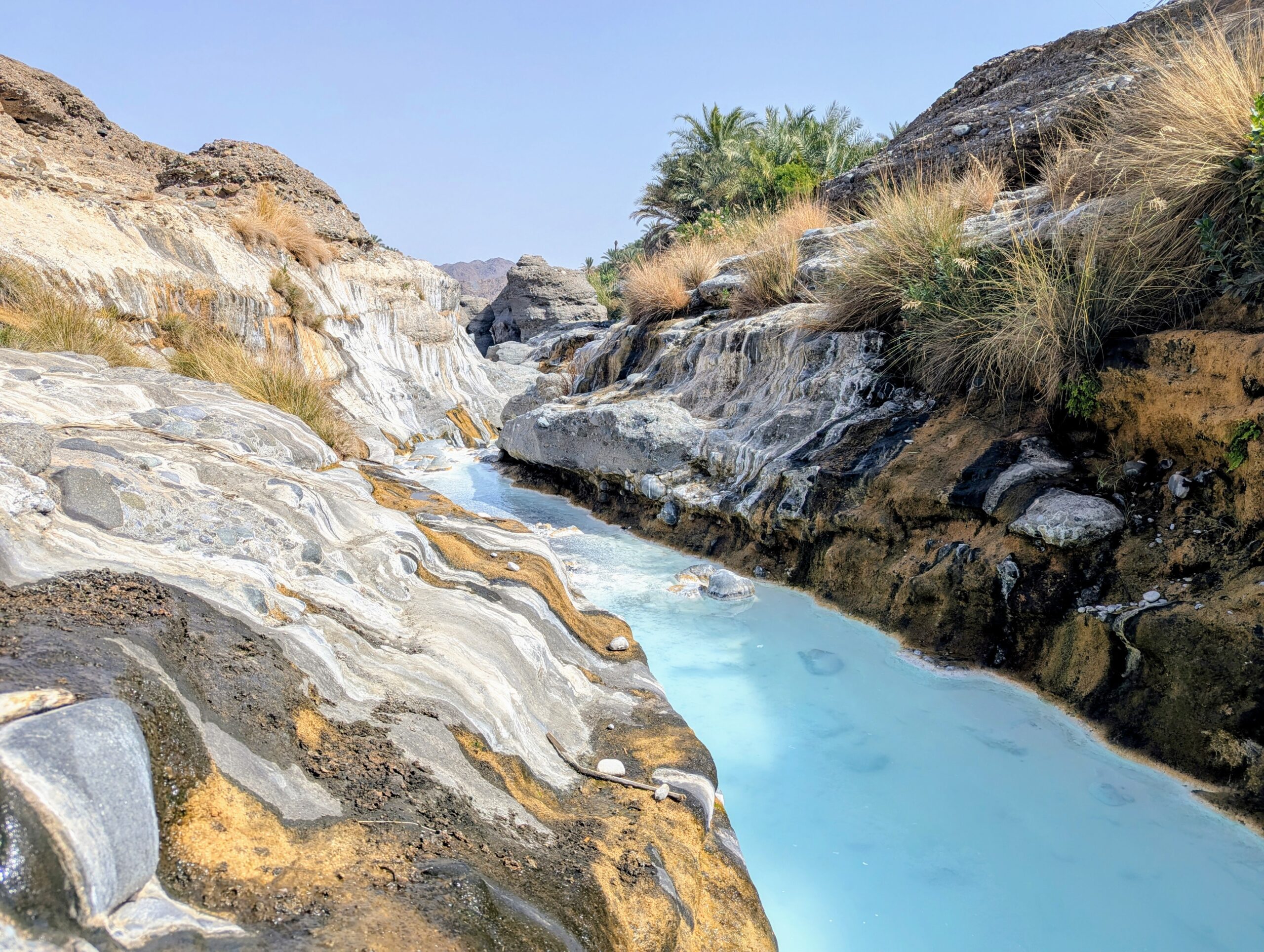 Wadi Hiking in Oman - Turquoise waters of Wadi Hoqain