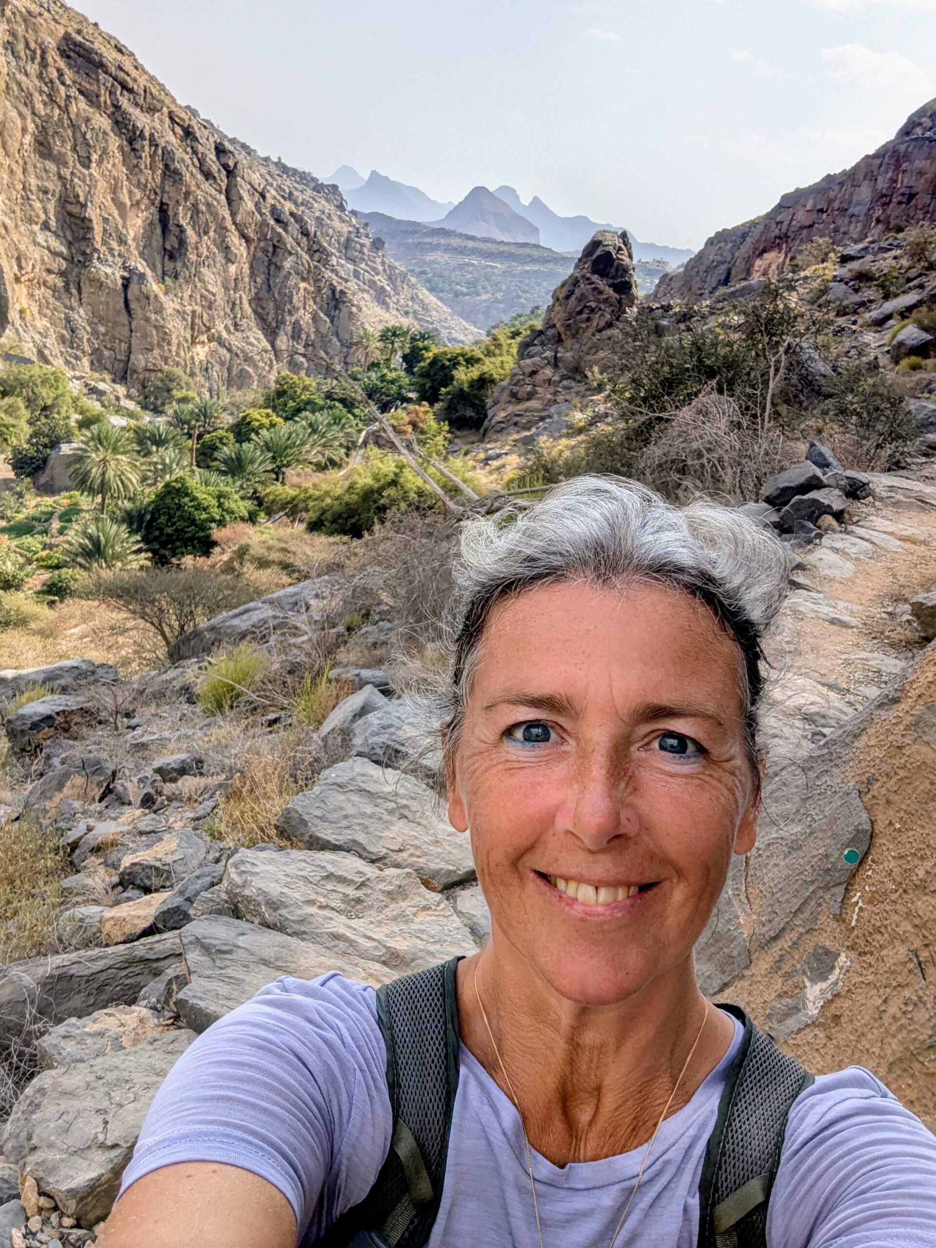 Happy on the trail in Misfat Al Abriyeen