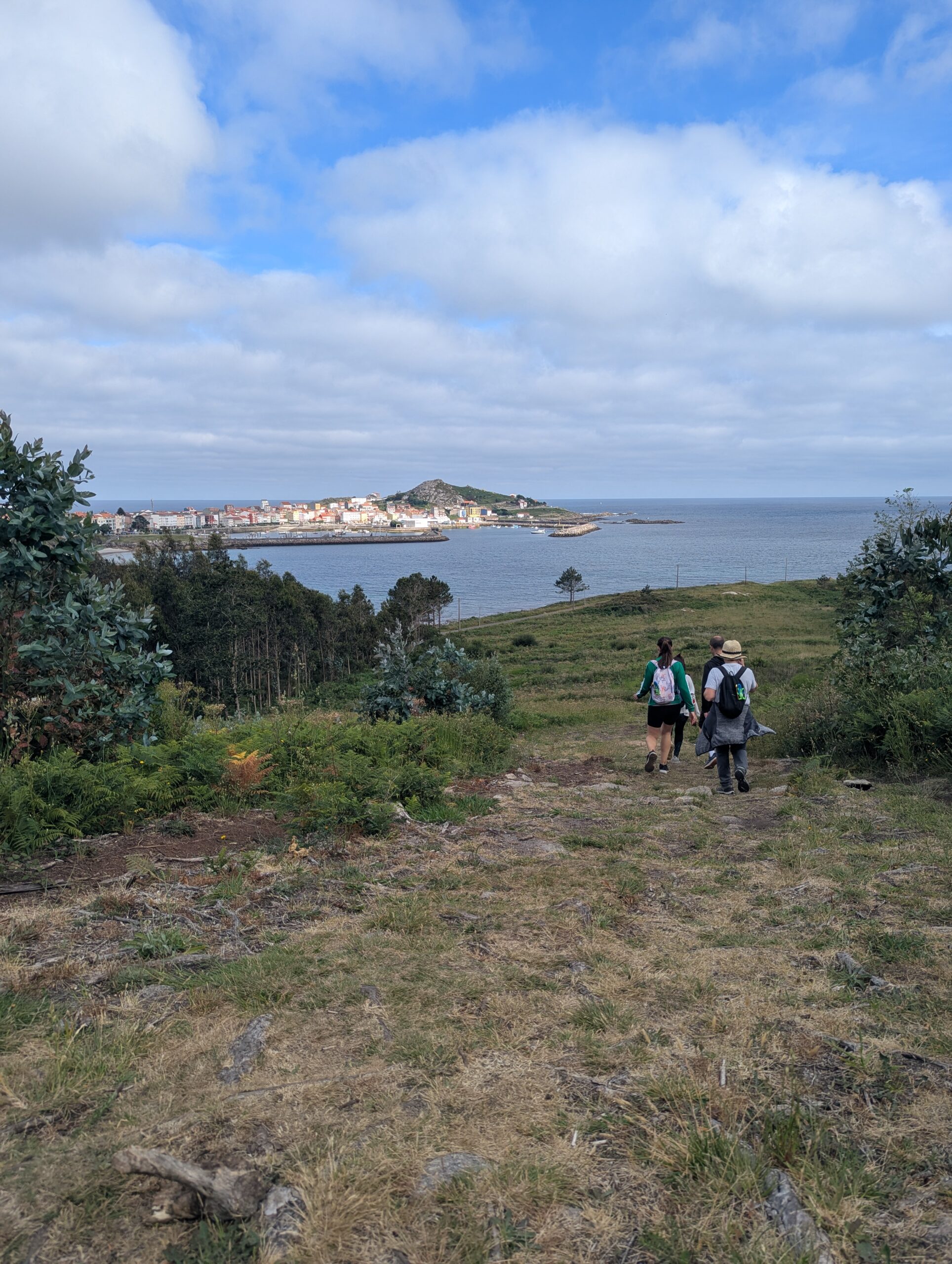 Pilgrims walking into Muxia